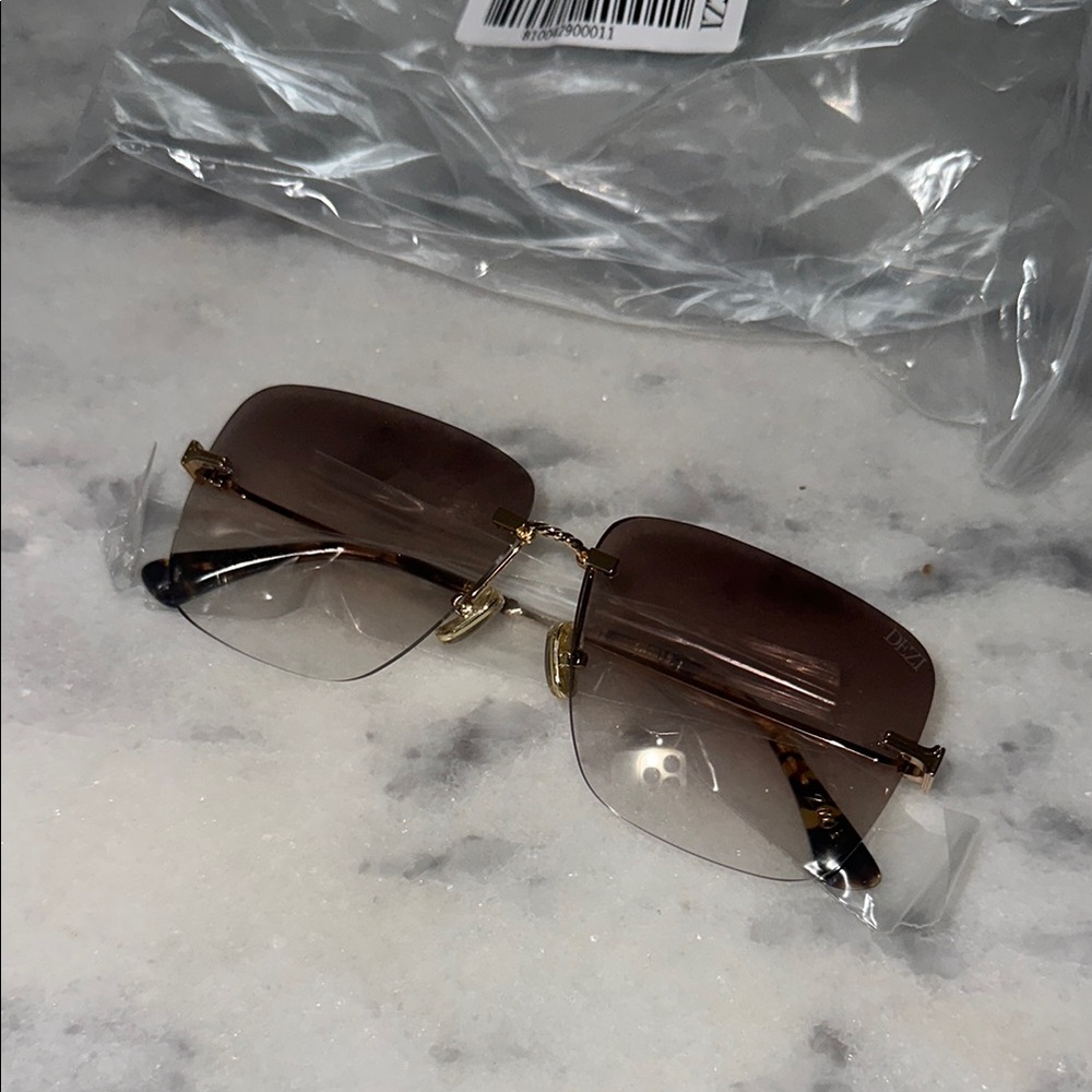 Dezi Stylish Brown Rimless Sunglasses
